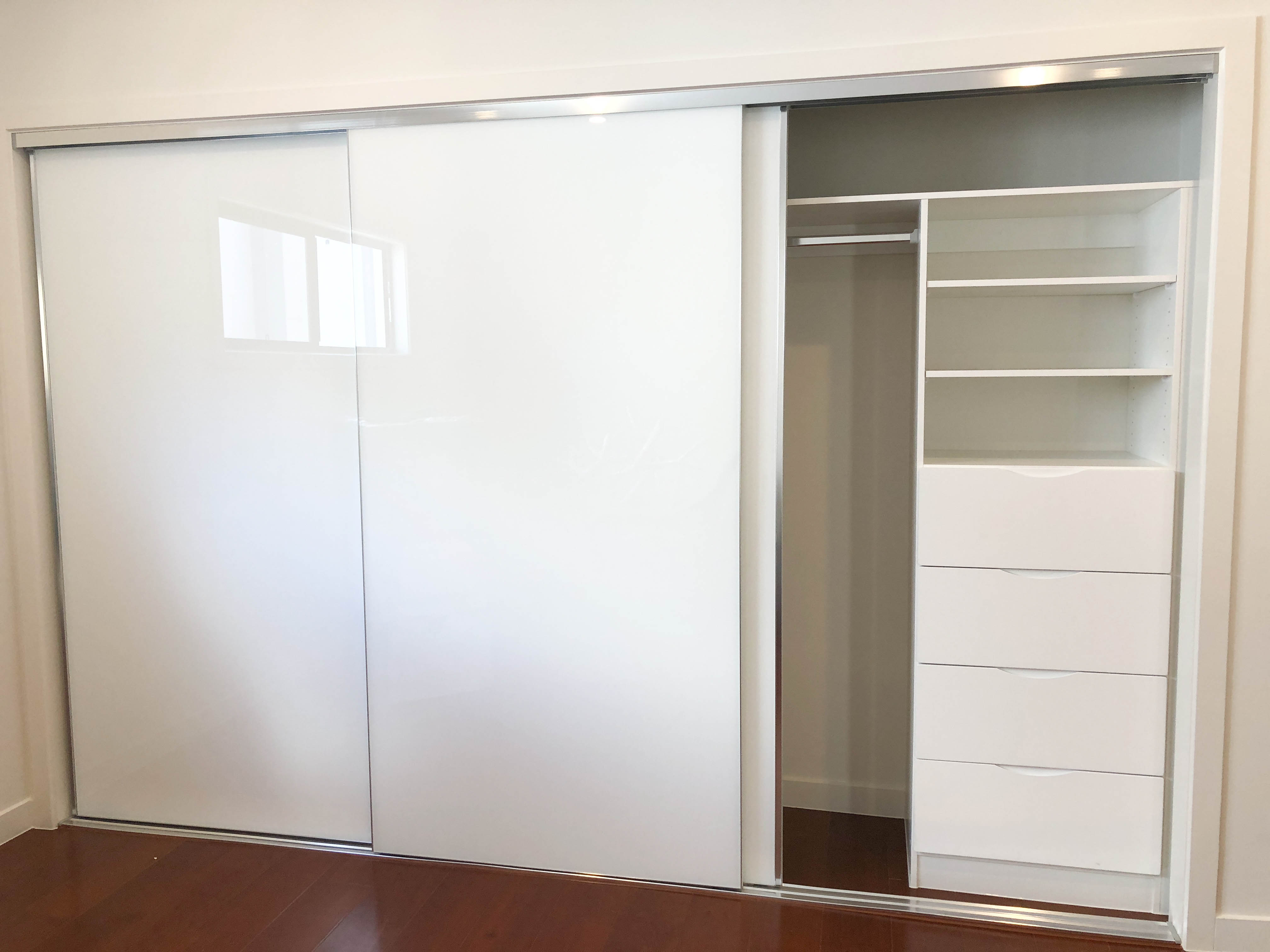 FRAMELESS SLIDING WARDROBE DOORS