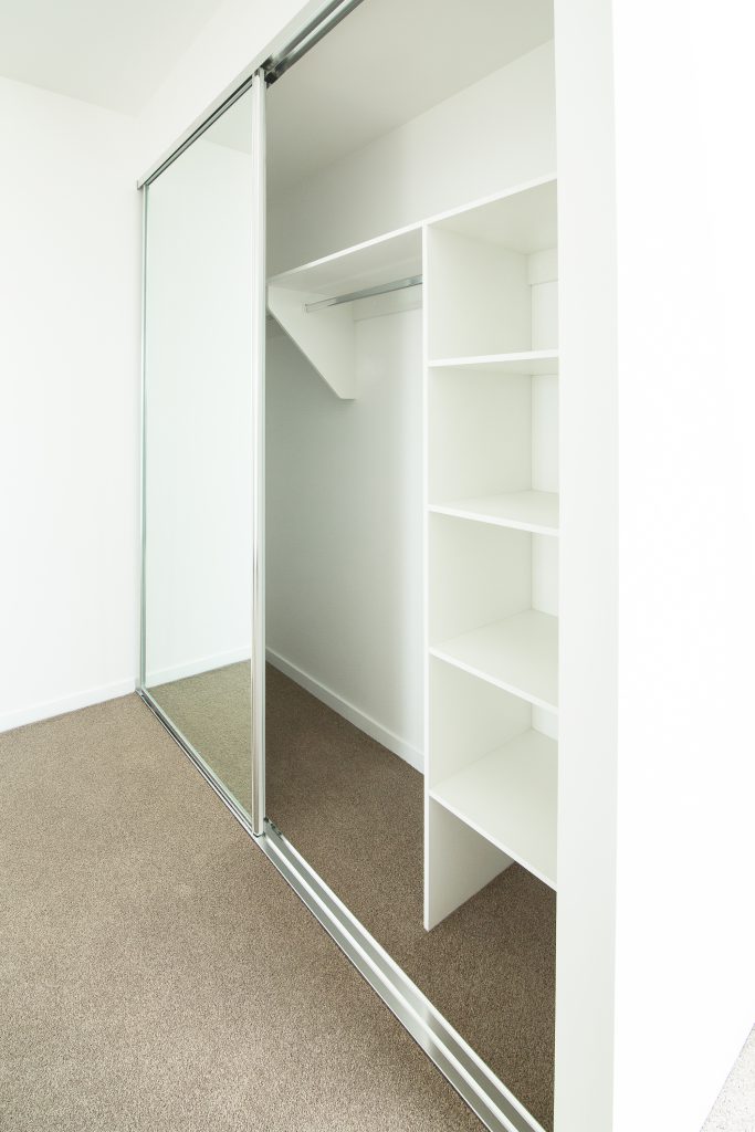 Frameless Mirror Robe Doors with Polished Silver Tracks & Built-in Wardrobe - Standard White Board Top Shelf & Shelving with Chrome Hanging Rod