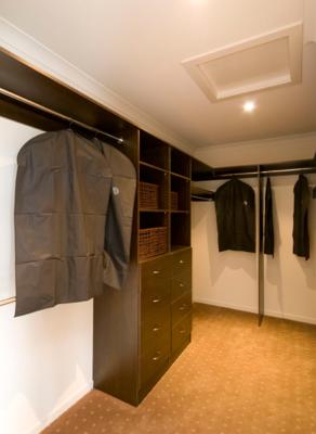 Walk-In-Wardrobe - Dark Brown Colour Board Shelving, Chrome Hanging Rods & Banks of Drawers with Polished Silver Handles