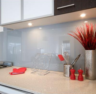 Grey Glass Splashback with kitchen cabinets on top