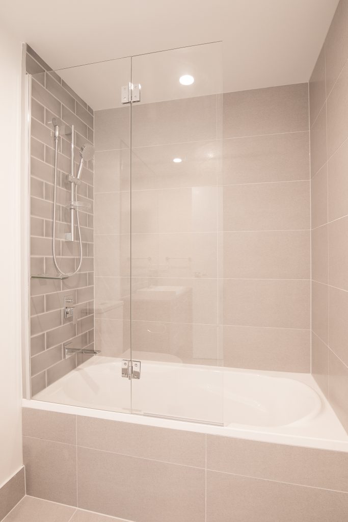 Frameless Fix & Swing Shower Screen with Polished Silver Hinges