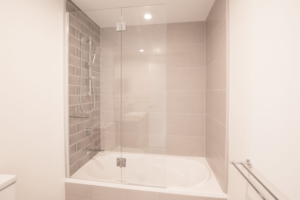 Frameless Fix & Swing Shower Screen with Polished Silver Hinges