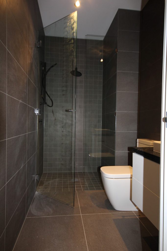Frameless Shower Screen with Polished Silver Hinges and Shower Screen Knob