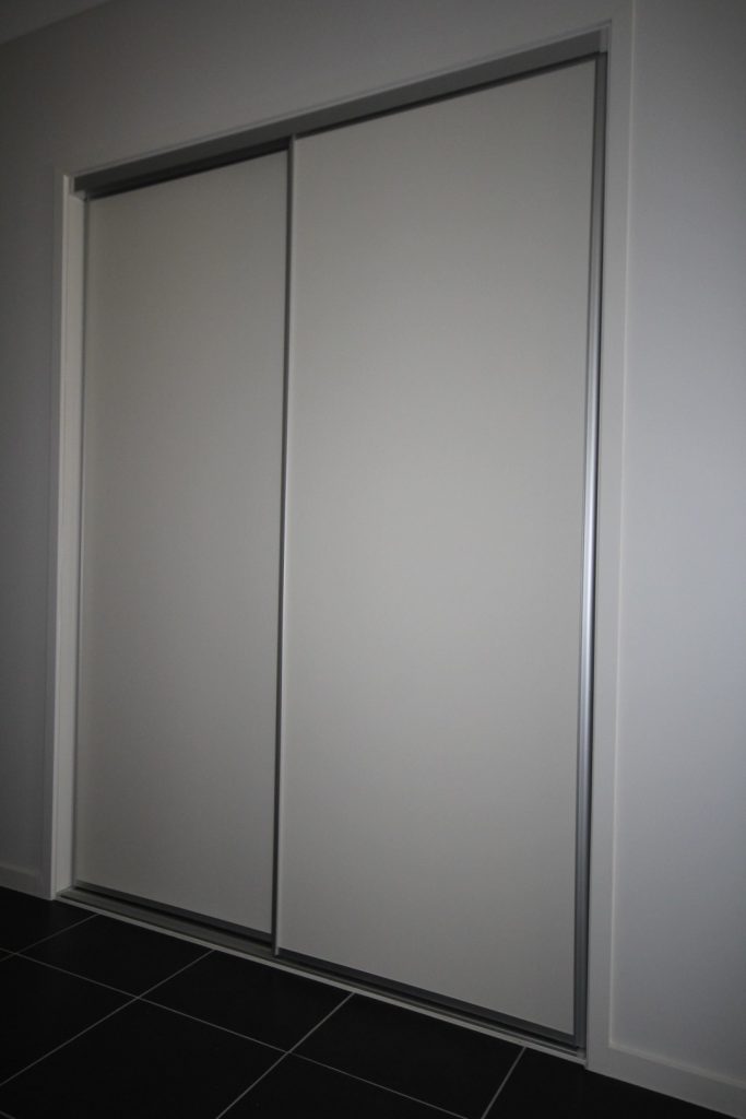 Polished Silver Framed Vinyl Robe Doors with Polished Silver Tracks