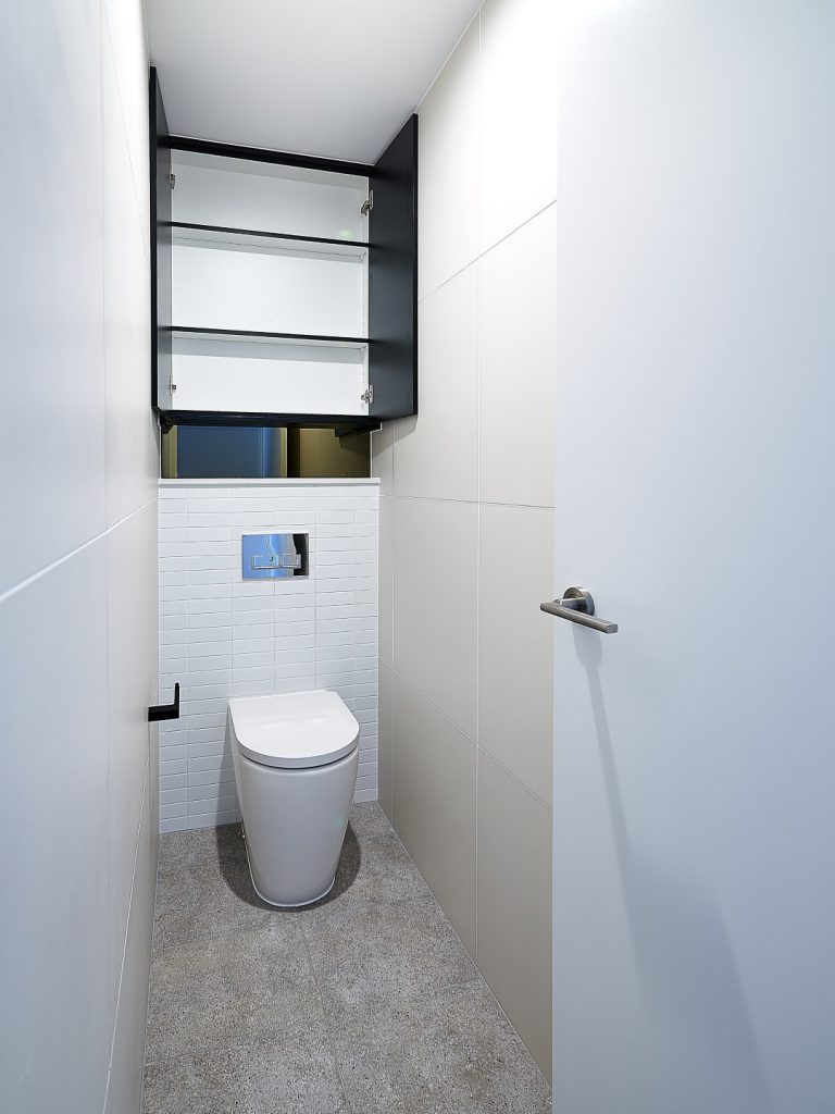 Matt Black Shaving Cabinet in small toilet