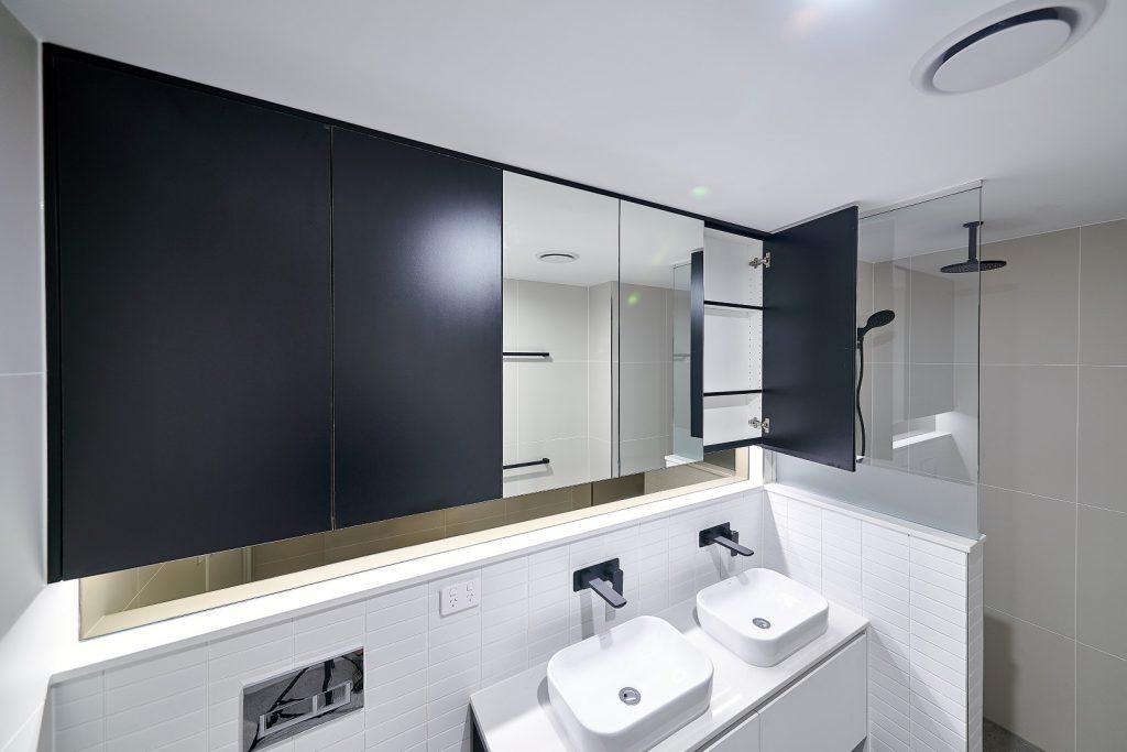 Matt Black & Mirror Shaving Cabinets with a Frameless Shower Screen Panel including a Privacy Strip
