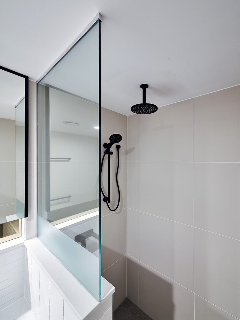 Frameless Shower Screen Panel with a Privacy Strip