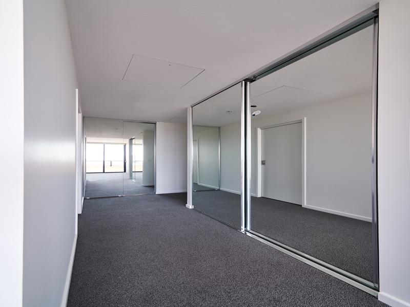 Frameless Built-in Mirrorline Wardrobe Doors in the Hallway
