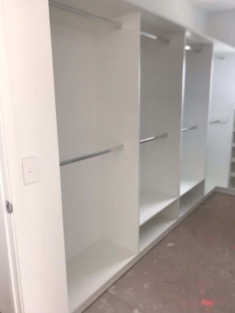 Built-In Wardrobe - White Board Shelving with Chrome Hanging Rods