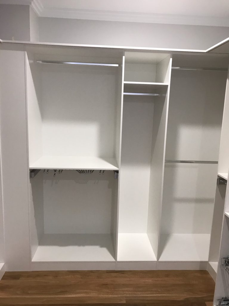 Built-In Wardrobe - White Board Shelving with Chrome Hanging Rods