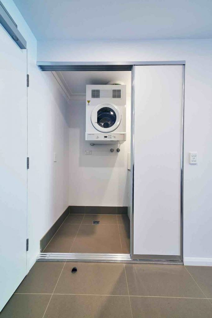 Slimline Sliding Robe Door with Laundry Compartment with silver aluminium frame
