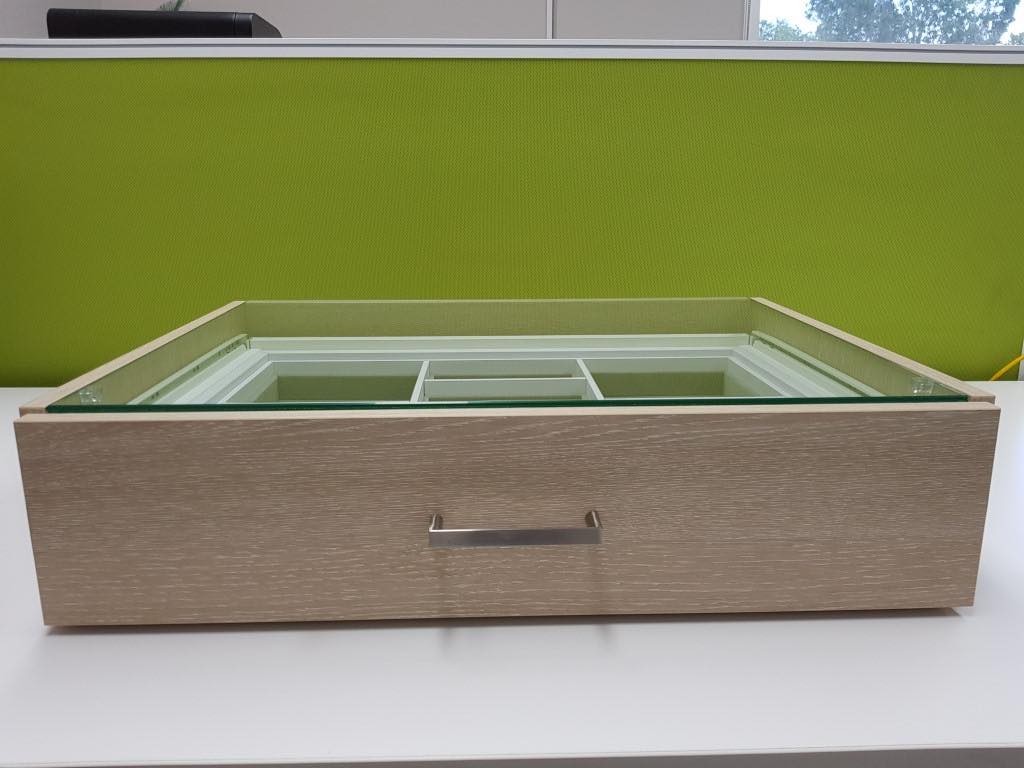 Nordic Oak drawer with silver handle and sliding white shelves inside glass storage