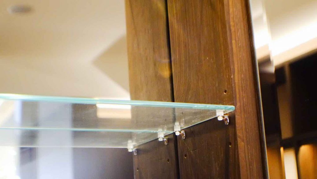 Natural Oak wardrobe shelving with glass shelve panel and silver hooks