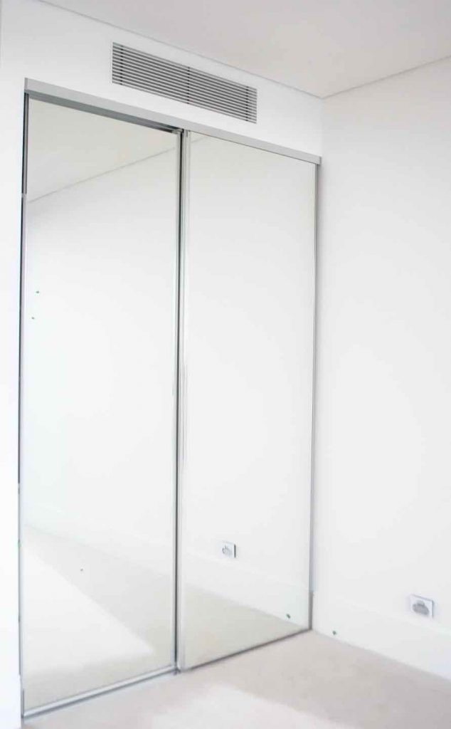 Frameless Mirror Robe Door in silver aluminium frame