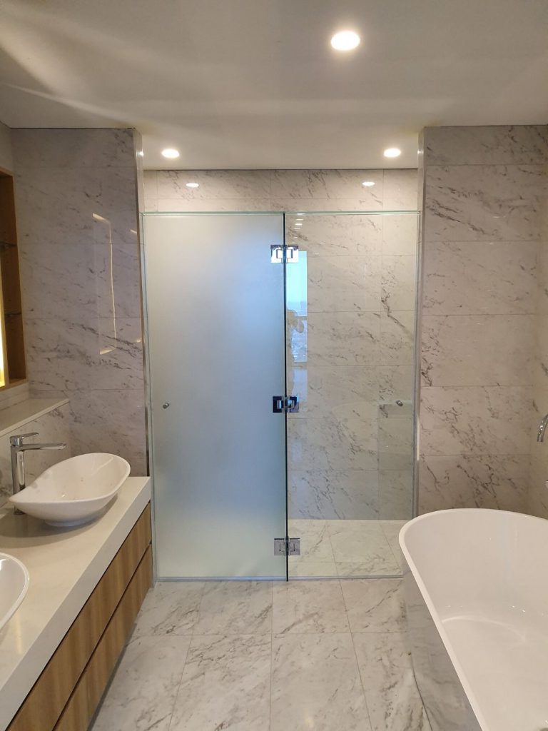 Frameless Shower Screen With Polished Silver Hinges LHS Acid Etched RHS Clear Glass